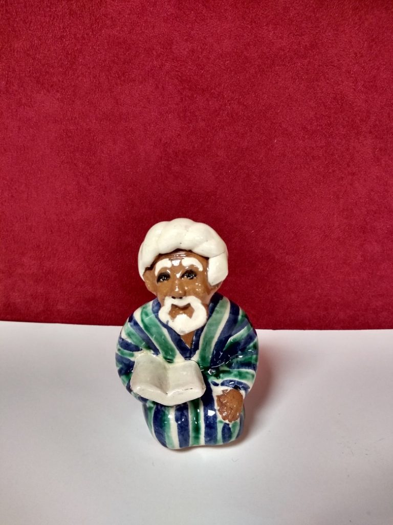 buy Figurine statues from Uzbekistan buy in Toronto.resized Uzbek figurines with book,Rishtan Pottery, size: 8*8cm.