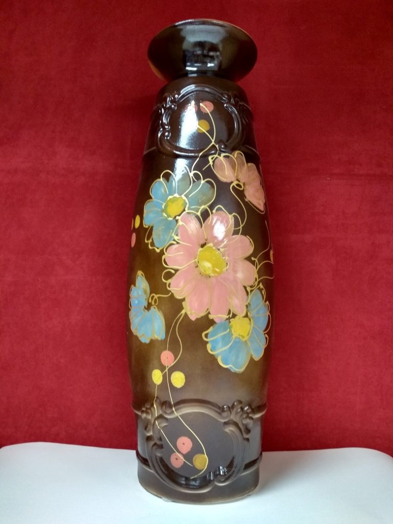 The designer ceramic flower vase, made in restrained brown color, is a versatile interior item that looks equally perfect both as a single product Hand made Decorative Ceramic floor vase "Summer" Brown. Height:65cm